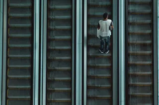 Escalator Queue Reduction: What does it have in Common with Transformational Supply Chain Management?