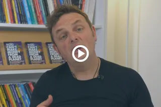 Mark Shayler in front of a book shelf