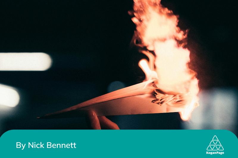 a communication letter shaped as a plane on fire