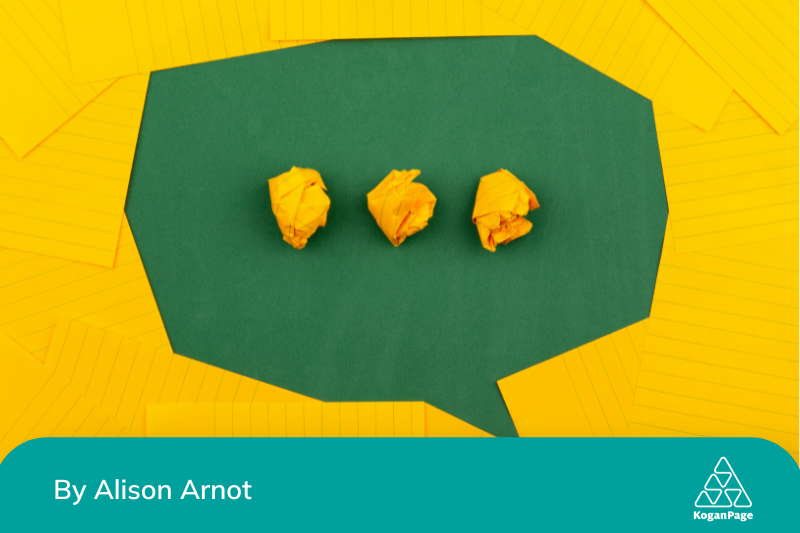 Yellow background with a green speech bubble in the middle. There are three dots made up of crinkled yellow paper in the middle of the speech bubble. 