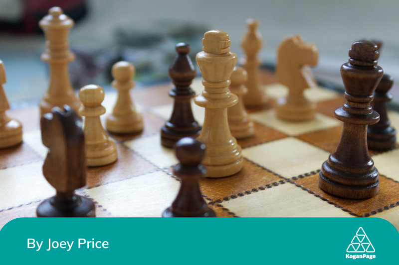 Chess pieces on a chess board to represent strategy