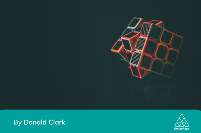 3D render of a red and orange outlined cube on a black background with a faded reflection