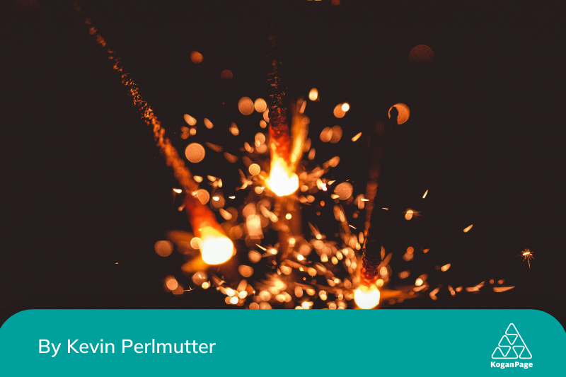 A close-up image of flying sparks against a black background