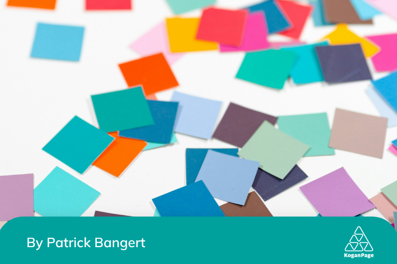 A photo of a document with multi-coloured sticky notes on a white background.